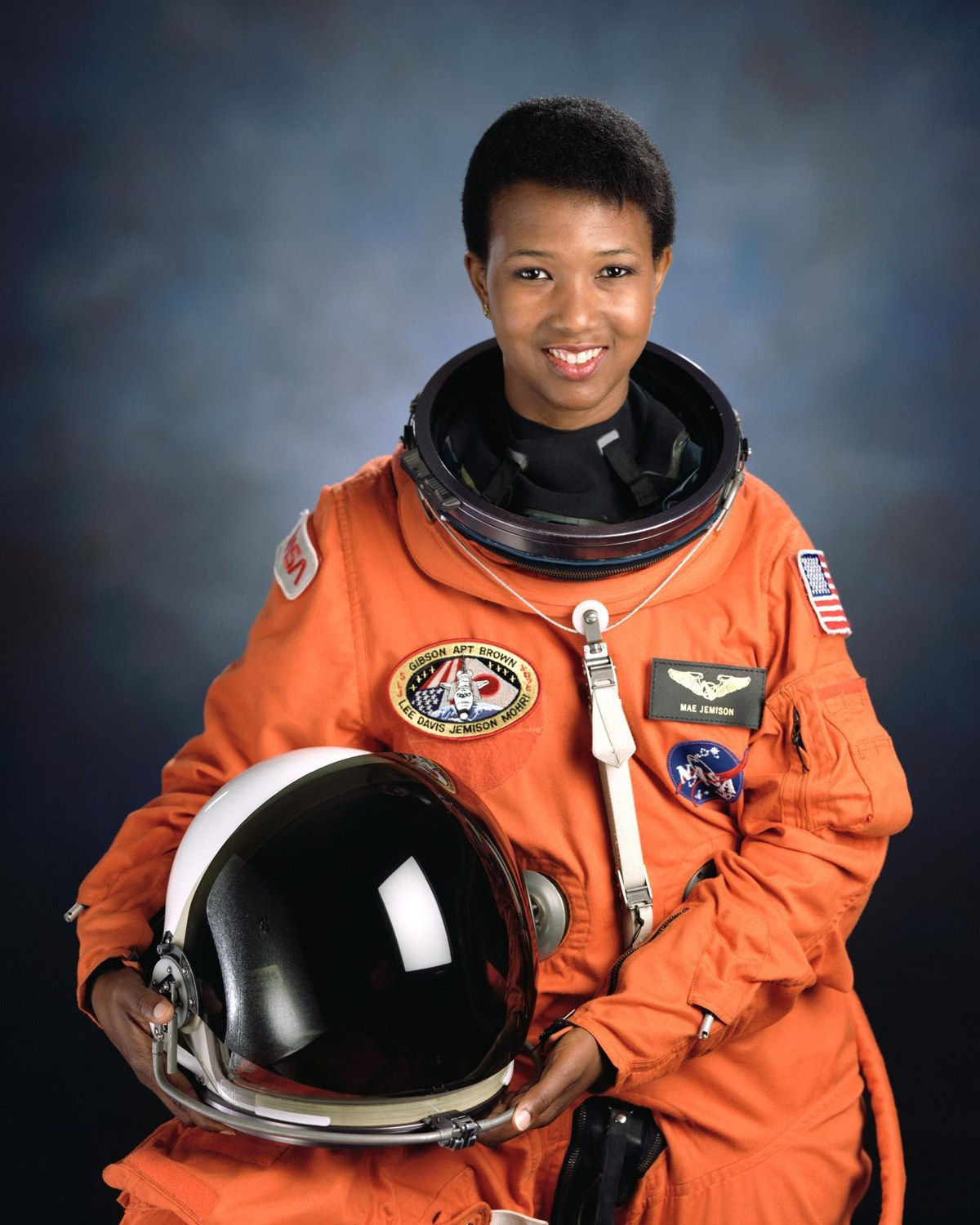 NASA astronaut Mae Jemison in her orange flight suit, the first Black woman in space